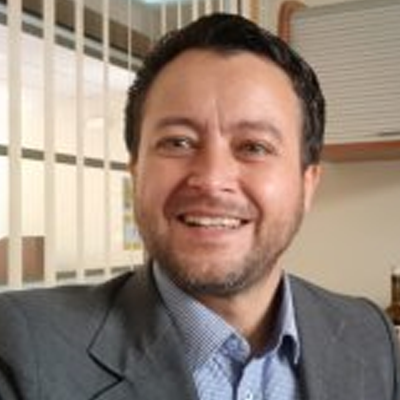 Dr. Carlos Albeiro Mora Villalobos